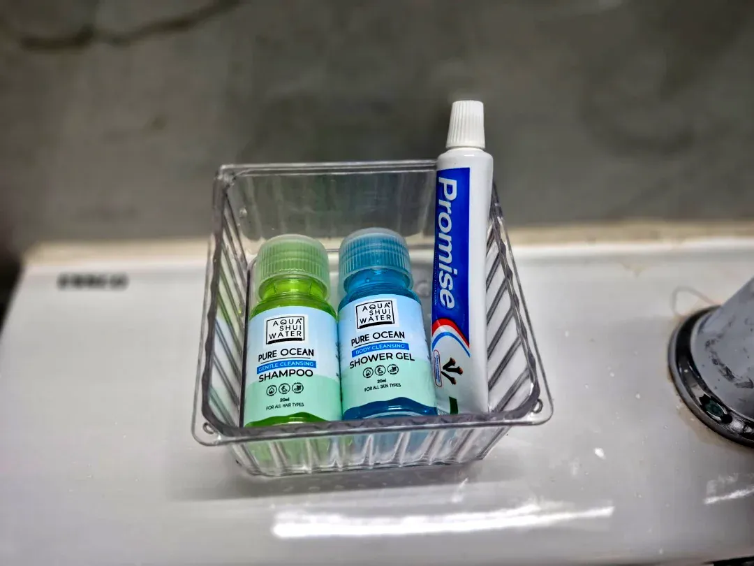 Pure Ocean shampoo, shower gel and toothpaste in a basket