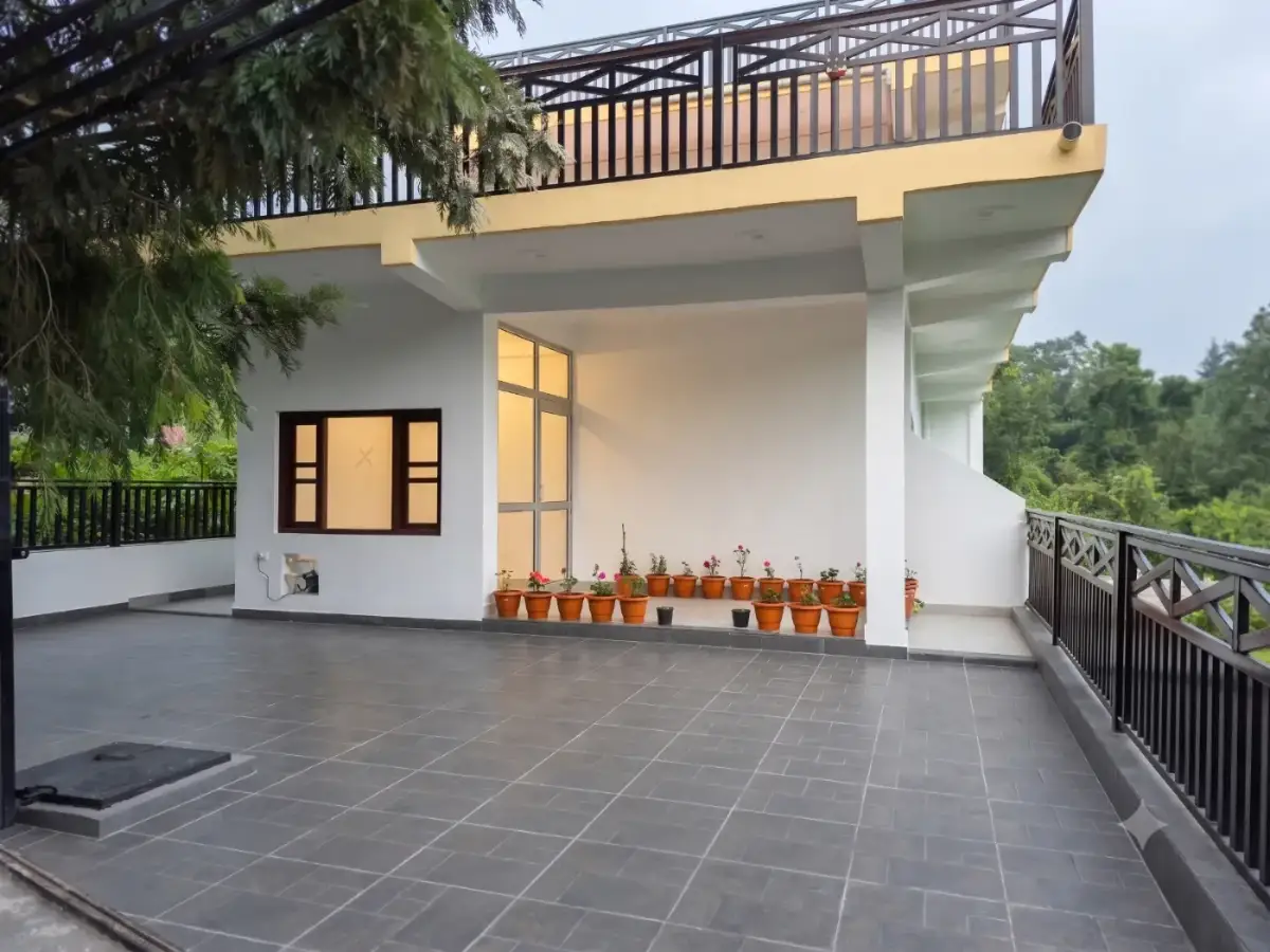 Blessed Aura — the property, balconies and courtyard above Bhimtal